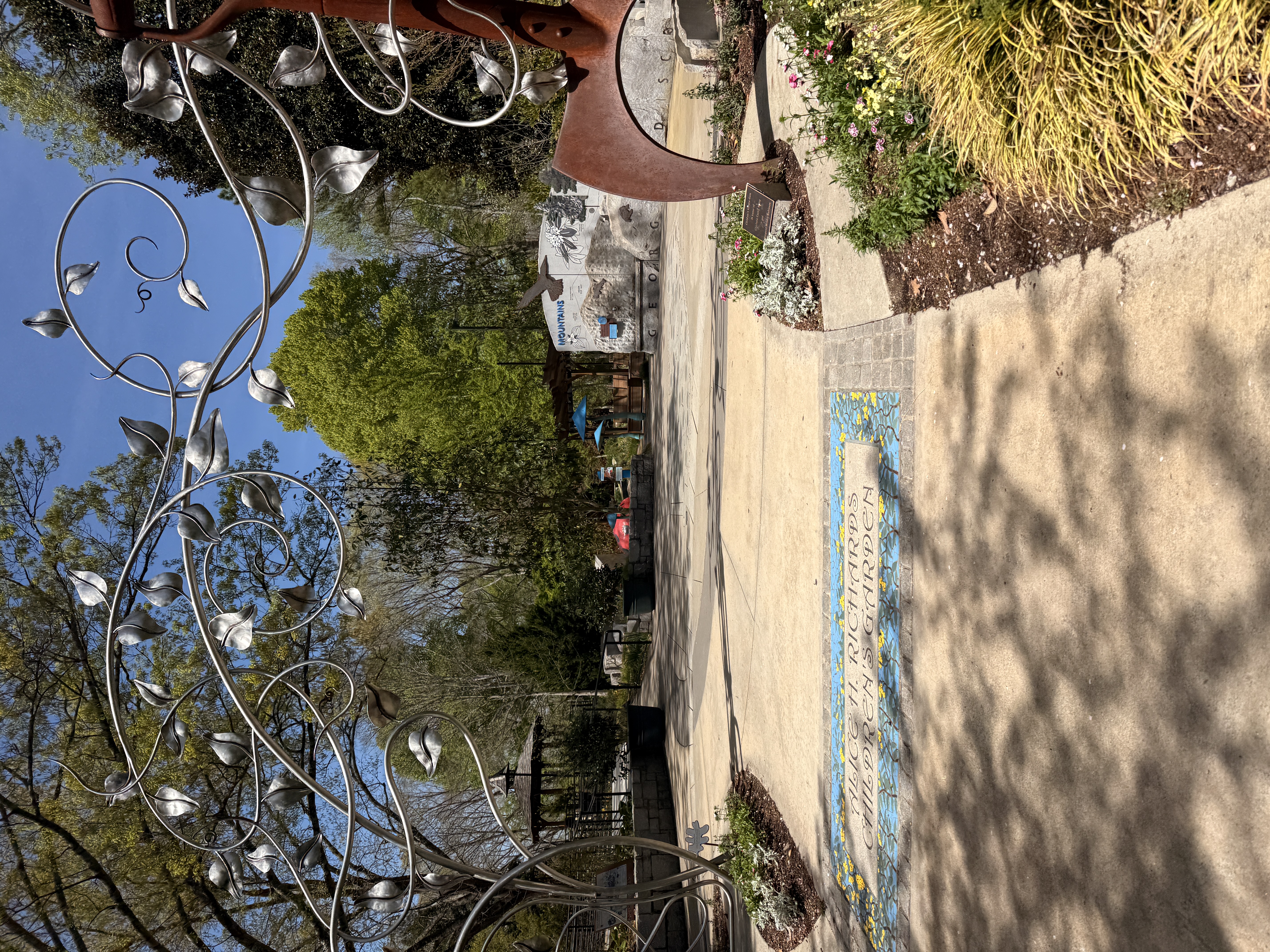 Children's Garden entrance with metal art