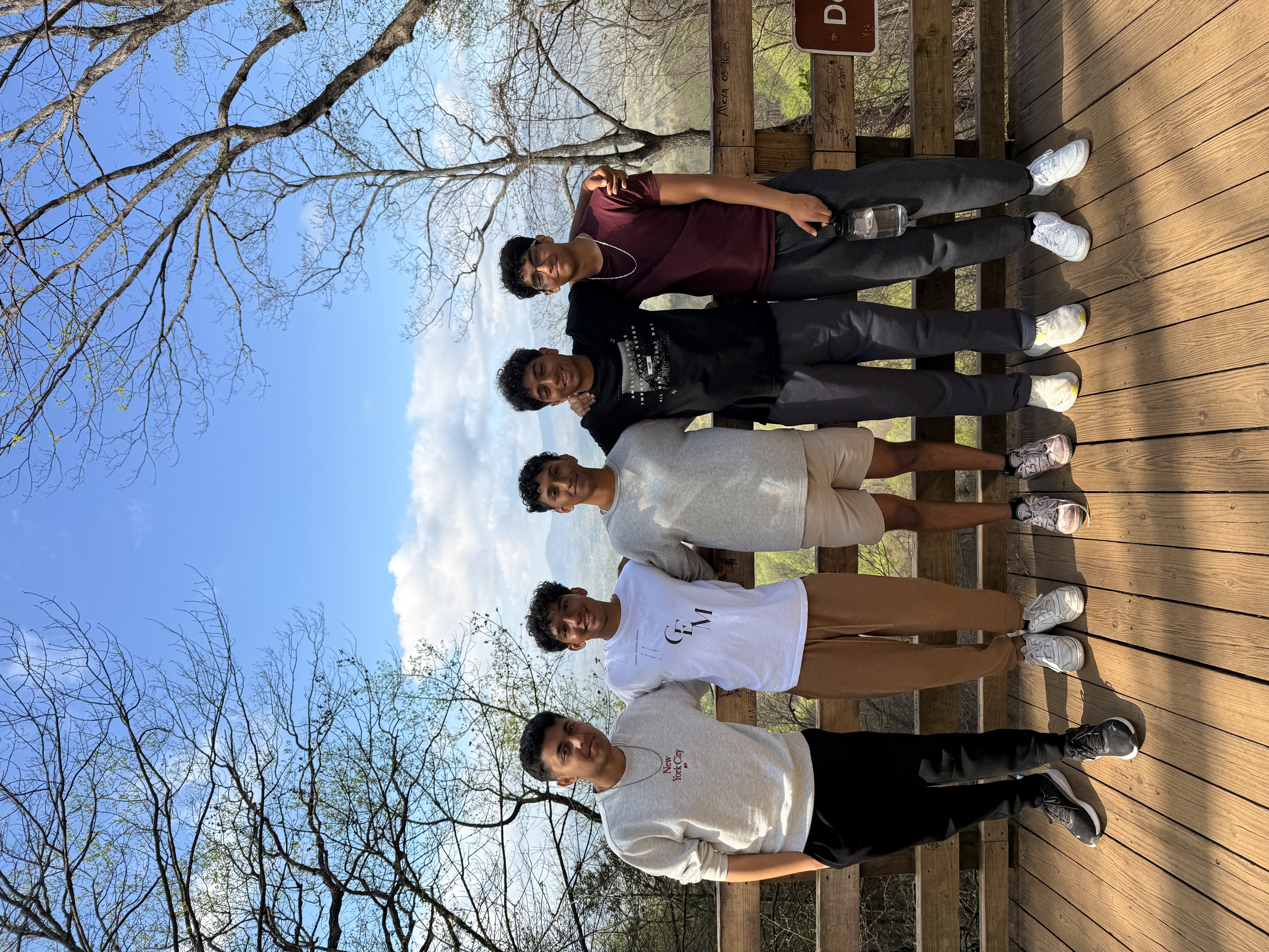Group photo at mountain viewpoint